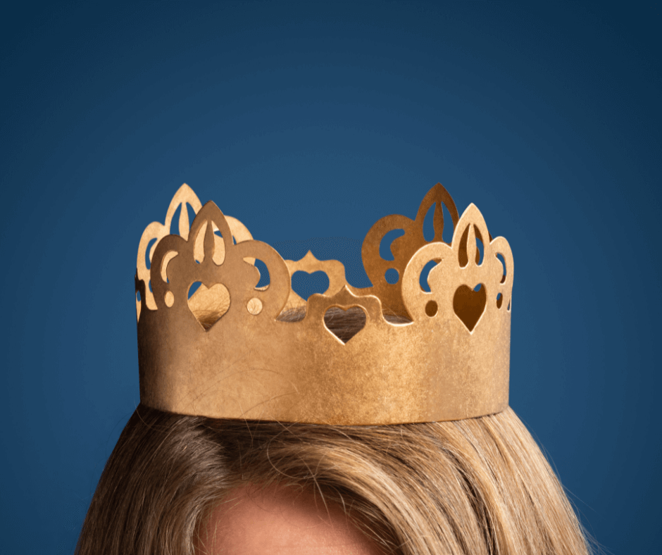 a golden crown on the head of a blond lady